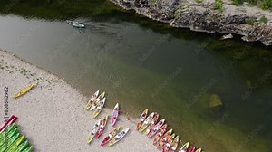 Colorful Crowd Of Canoes At Ardeche River In France. Aerial Drone Shot