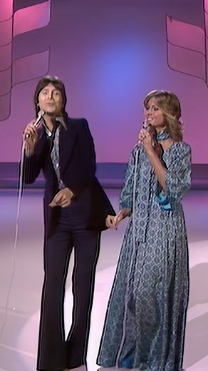 5.7M views · 88K reactions | Now LIVE on the Official Olivia Newton-John YouTube channel is the full performance of "I'm Leaving It All Up To You" with the great Cliff Richard. Enjoy this magnificent performance: https://youtu.be/80f1-YmUaGA | Olivia Newton-John | Facebook