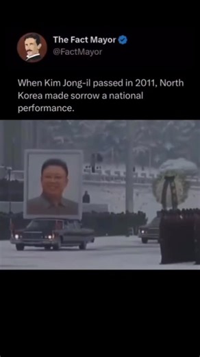 Fact Mayor on Instagram: "When Kim Jong-il died in 2011, North Korea’s grief became more than a moment of national mourning — it was a meticulously orchestrated performance. State television broadcast scenes of citizens sobbing in perfect unison, soldiers marching in solemn parades, and a towering portrait of the late leader overlooking the grand funeral procession in Pyongyang. Every tear, every bow, and every salute was part of a spectacle designed to project unity and devotion. But behind the