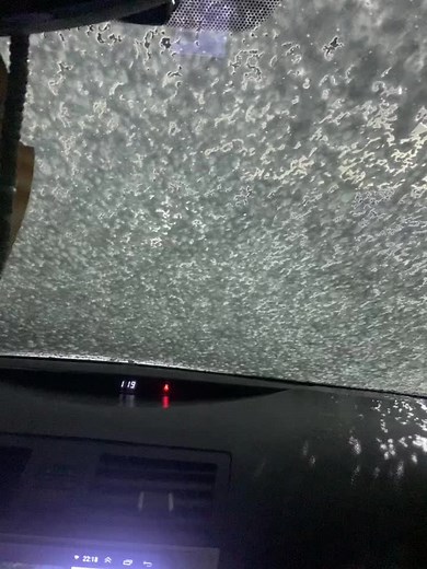 Car Wash Experience: Dashboard and Windshield Perspective