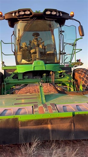 John Deere W235 Swather