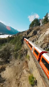 It looks like a railway model, but it's real: a Rhaetian Railway train crosses the Landwasser Viaduct in the Swiss Canton of Graubünden. The railway bridge is a UNESCO World Heritage Site. Have you ever traveled through Switzerland by train? 📍 Landwasser Viaduct, Switzerland 🎥instagram.com/gianalex_ | DW Travel