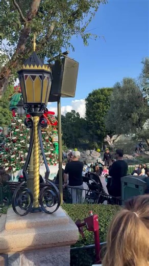 Signing Santa Brings Joy to Disneyland Visitors