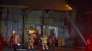 Car battery warehouse catches fire, forces evacuation of nearby apartments