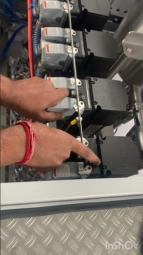 Swapping servo motor cables to identify the fault.