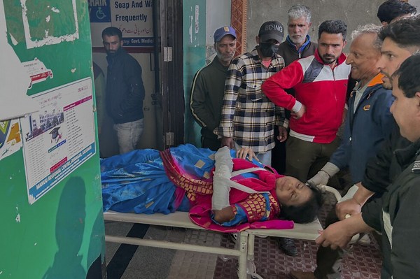 Militants kill at least 26 tourists at a resort in Indian-controlled Kashmir