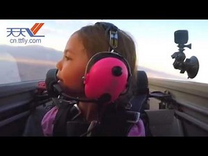 Brave little girl fly an airplane