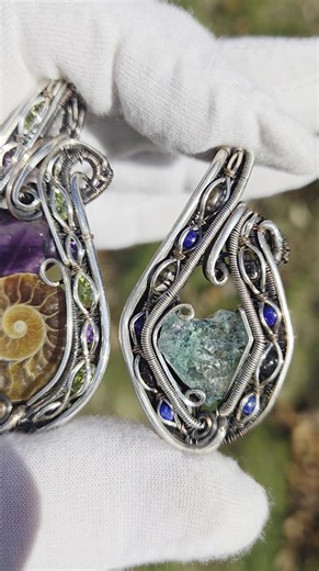 Sunday showoff and special😍 ~Fluorite crystal wrapped in oxidized copper and sterling silver with accents in Lapis and Smokey Quartz ~Ammonite fossil and Amethyst wrapped in oxidized copper and sterling silver with accents in Amethyst and Peridot Check out my post from earlier for details on these pendants 😍 | Lone Stone Designs