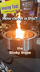 Proud of our RVing friend Eddie for creating such a clever fire pit. He’s got it on display here at the Tampa RV Supershow! It can be woodburning or propane—and a grill too. Packs down small! You can find it on his website slinkystove.com😊 #rvlife #firepit #coolstuff | The Fit RV
