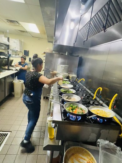Cooking Together in a Busy Kitchen Environment