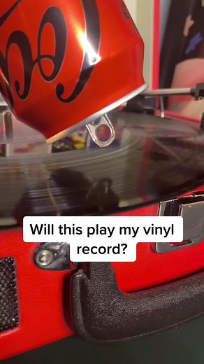 Vinyl Record Player Setup with Unique Soda Can