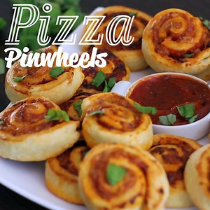 Pizza Pinwheels - homemade buttery dough filled with pizza toppings, rolled into small treats and served hot is simply hard to resist. Full recipe: https://bit.ly/2Hwdgfv | Home Cooking Adventure