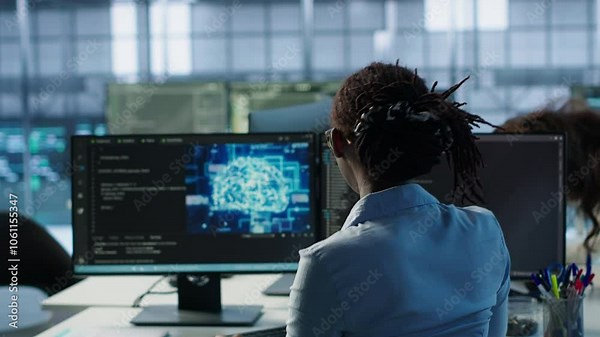 Engineer typing on computer in server hub, monitoring data center energy consumption using AI software. Technician inspecting rackmounts in server room using artificial intelligence tech, camera A