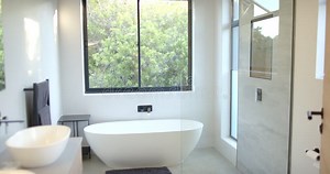 Modern Bathroom with Freestanding Bathtub and Large Window Overlooking Greenery, Copy Space Stock Video - Video of comfort, stylish: 354367243