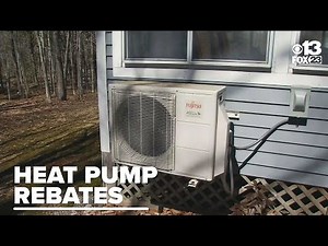 Why does Efficiency Maine's rebate program exclude multi-head heat pumps?