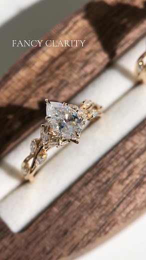 384 reactions | The same carat weight, two captivating silhouettes — the Whispering Vines Oval Cut and Whispering Vines Pear Cut engagement rings. Both crafted in 14K gold with vine-inspired detailing and brilliant moissanite sparkle.  Which one matches your style — Oval’s grace or Pear’s allure? 20% OFF CODE:F20 | Fancy Clarity | Facebook