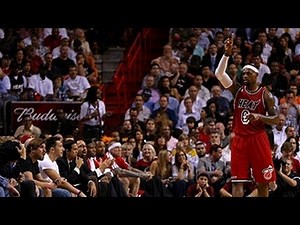 LeBron plays catch with Heat fan in stands!