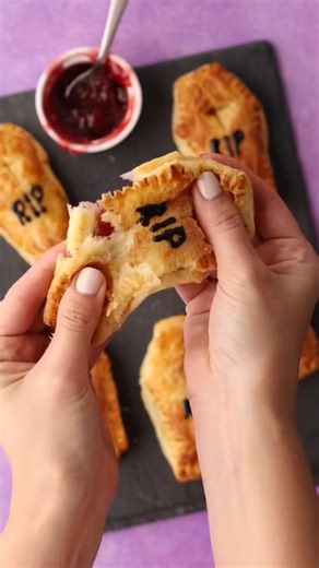 These coffin-shaped pop tarts are flaky, spooky, and filled with raspberry jam. The perfect Halloween bake! 👻 You’ll need 1 roll puff pastry 6 tsp raspberry jam 1 egg 1 tbsp milk ½ tsp cinnamon 1 tsp sugar Black icing for decoration Cut, fill, bake 10 minutes, and finish with your “RIP” details. A quick, kid-friendly Halloween dessert! 🎃 #halloweenbaking #poptarts #halloweentreats #autumnvibes #bakingfun | Seen by denikoe