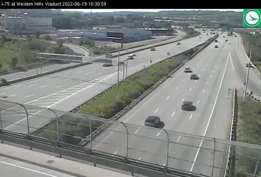 VIDEO: Cameras caught the moment a vehicle traveling southbound on I-75 flipped over a guardrail and landed on the street below. Police said the driver is now in stable condition. Details: https://bit.ly/3xGZtZS | WLWT