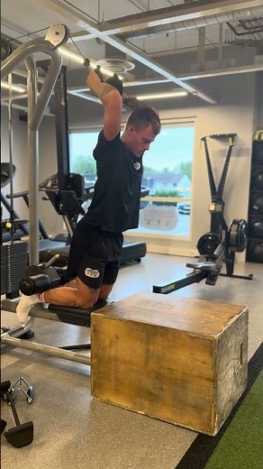 Assisted Nordic Hamstring in Lat Pulldown machine