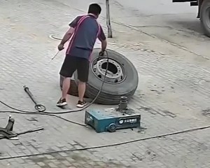 Exploding Tire Hits Customer