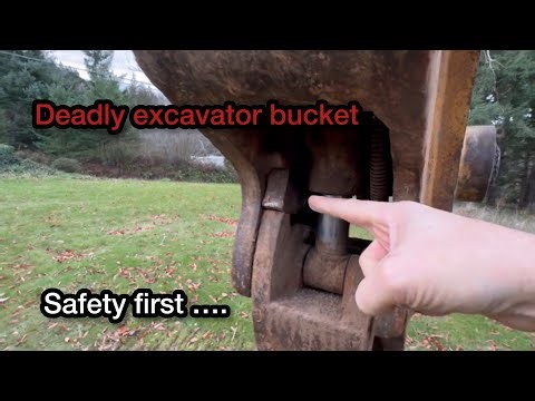 Excavator bucket, falling off to kill…