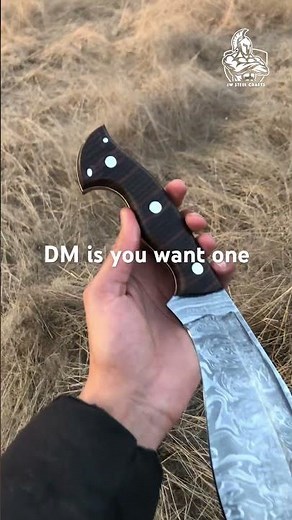 handmade Damascus Kukri knife with stunning patterns and fine finishing.