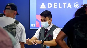 Delta Air Lines to hike up health insurance premiums for unvaccinated employees by $200 a month