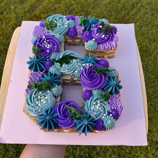 Ready for a ROAR-some 6th birthday! 🦖#milkandcookiecakes #cookie #cookiecake #cake #asmr #asmrsounds #funfetti #funfetticookie#funfettirecipe #bakery #buttercream #cakedecorating #hobbybaker #dinosaur #dinosaurcake #dino #dinobirthday | Milk & Cookie Cakes