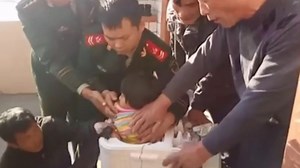 Young Girl Stuck in Washing Machine Is Rescued With a Hand Saw