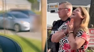 Woman seen defecating on another car in road rage video