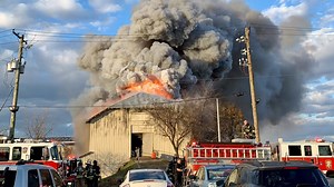 Heavy smoke seen 'for quite some distance' after empty warehouse goes up in flames
