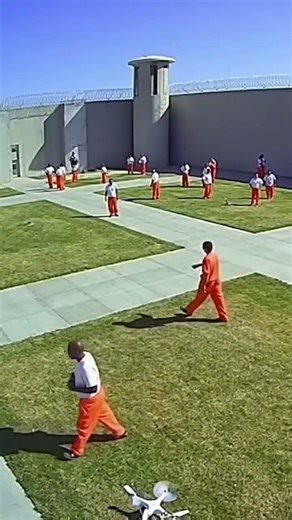 drone drops contraband package in prison yard inmate grabs it then drone crashes #prison #viral