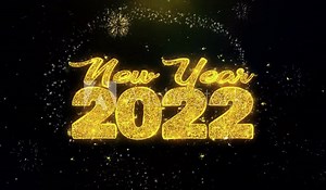 New Year 2022 Text Wish on Gold Glitter Particles Spark Exploding Fireworks Display. Greeting card, Wishes, Celebration, Party, Invitation, Gift, Event, Message, Holiday, Festival 4K Loop Animation. Stock Video