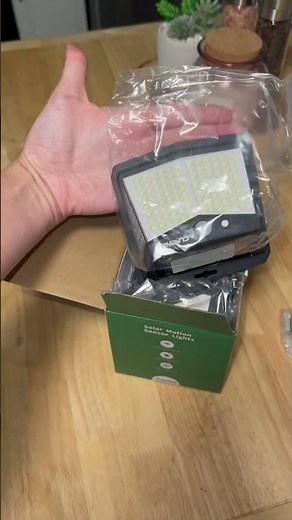 unboxing of CLAONER Solar Lights Outdoor 128 LED/4 Pack