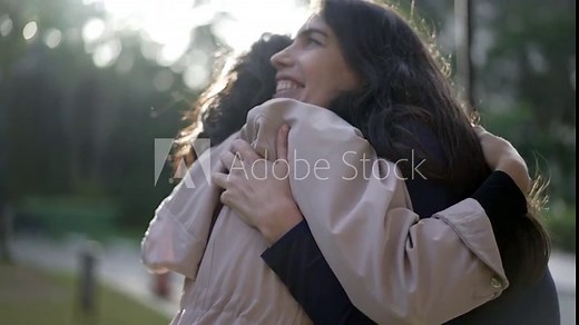 People connecting physically. Two women embracing each other. Female Friends hugging