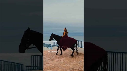 Stunning Woman Horseback Riding on the Beach