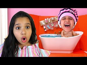 Shafa found the Baby doll and pretends to be his parent