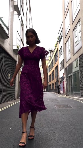 Walk down the street with main character energy in this Jacquard Star V Neck Midi Dress 💜 Shop the dress online here - https://bit.ly/475Rk0U | Dorothy Perkins