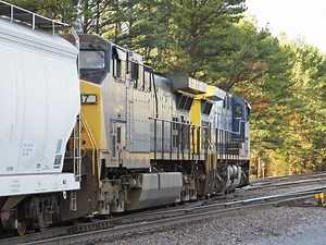 CSX northbound manifest freight train led by GE AC44CW locomotives # 407 & # 47 as they cross over 3 tracks while entering the yard at Erwin, Tennessee, October 27, 2007