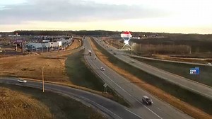 Hot air balloon crashes into power lines in Minnesota, sparking a brush fire