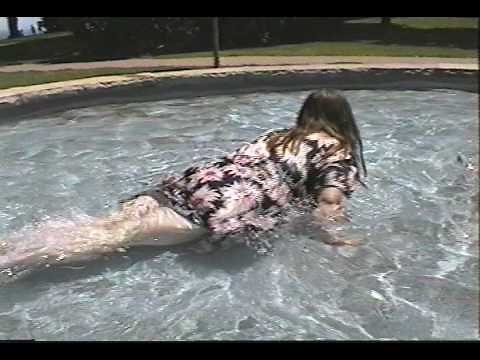 Fountain swim in dress.