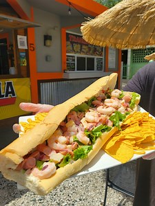 831K views · 10K reactions | el Ayuso 稜 Gigante Sandwich de Mariscos 撚戀 casi 1 Libra de Pan  3 Carnes Diferentes y Te lo Pican en 4.. Monumental ! | Puerto Rico desde el Aire | Facebook