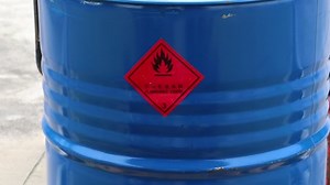 Warning symbol for chemical hazard on container