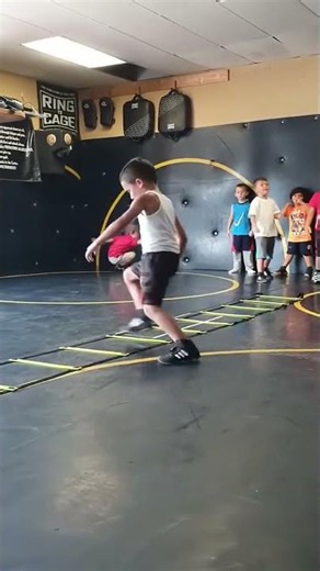 Running drills on a ladder for speed and agility