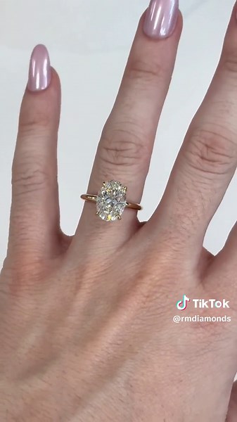 3.60 Carat oval cut engagement ring G, VS2 on an 18k yellow gold classic solid band - custom made for a client. For their privacy, contact us to inquire price #day17 #engagementring #goldring #ovalengagementring #ovaldiamond #propose