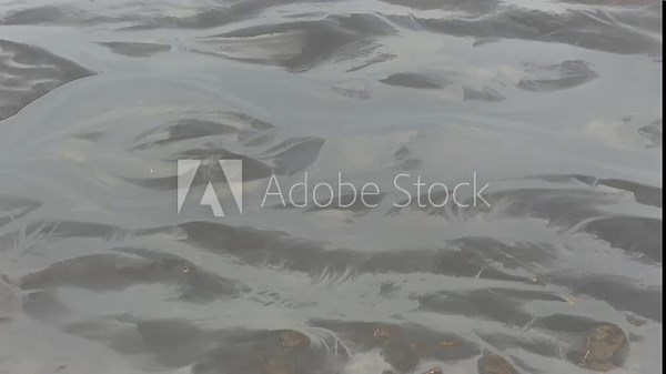 Wind eroded snow bedforms in Iceland, where sastrugi‑like ridges and ripples produced by aeolian transport and sublimation form elongated microdunes aligned with the prevailing wind direction.
