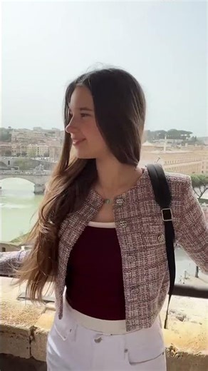 Karolina Protsenko (15 yrs) - Posing on balcony with a view of a bridge in Naples (Mar 30, 2024)
