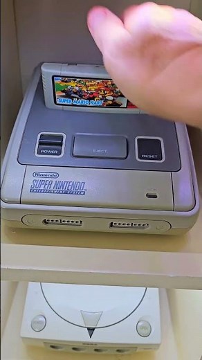 Inserting Game Cartridges into Retro Gaming Consoles