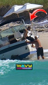 Boat BEACHED at Haulover Inlet! Should the Captain have dropped the anchor earlier? A Wellcraft boat suffered mechanical failure at Haulover Inlet, drifting perilously close to shore. Despite efforts to deploy the anchor, the relentless waves forced it onto the beach. Fortunately, it avoided the rocks, preventing injuries and major damage to the boat. Our team alerted the authorities of the situation as it developed. | Wavy Boats